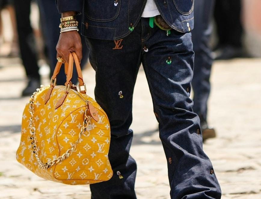 accessories bag handbag clothing pants purse jeans person footwear shoe
